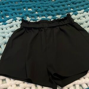 Black SHEIN shorts , never worn, comes with a belt strap.